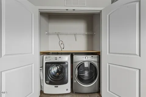 a view of a house with a garage