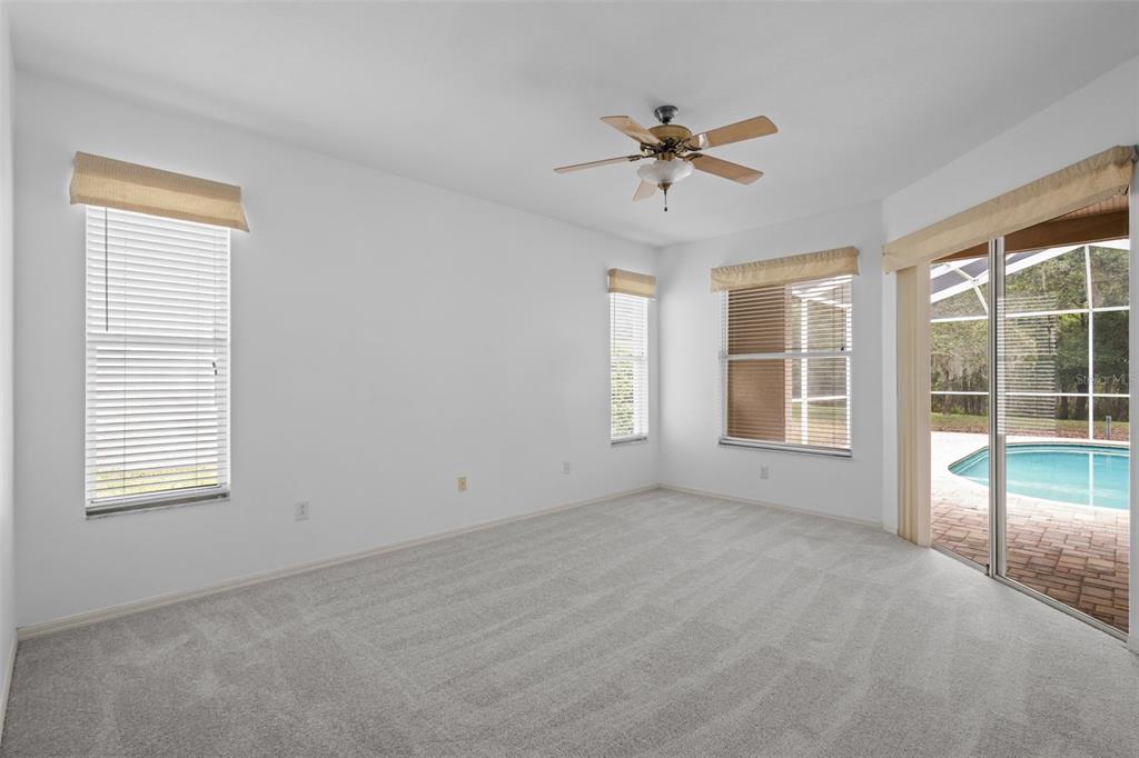 18543 Bittern Avenue Lutz, FL 33558 - Photo 35 of 45 a view of an empty room with a window
