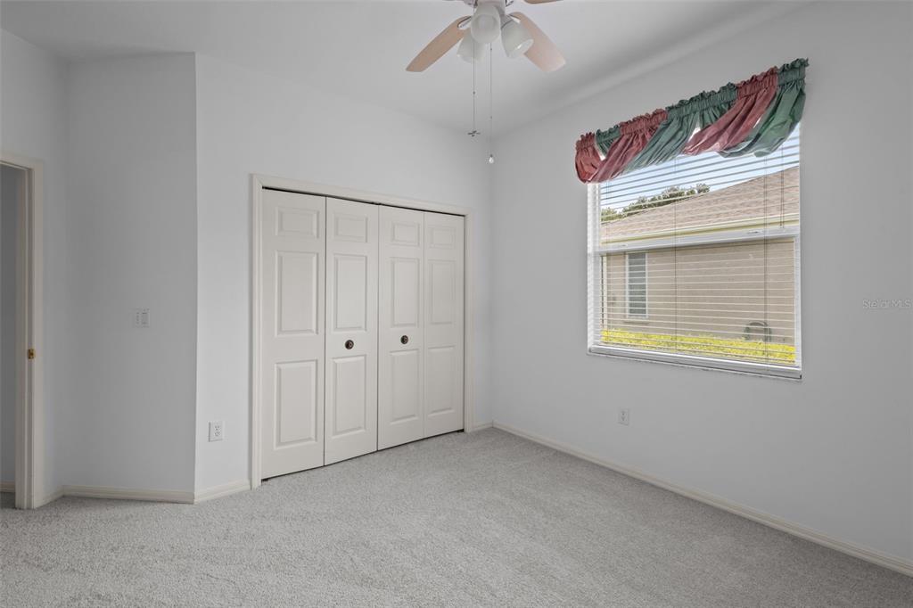 18543 Bittern Avenue Lutz, FL 33558 - Photo 38 of 45 a view of an empty room with a window