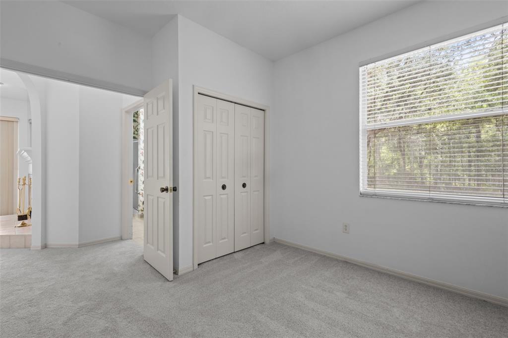 18543 Bittern Avenue Lutz, FL 33558 - Photo 41 of 45 a view of an empty room with a window