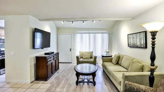 a view of a livingroom with furniture and a couch