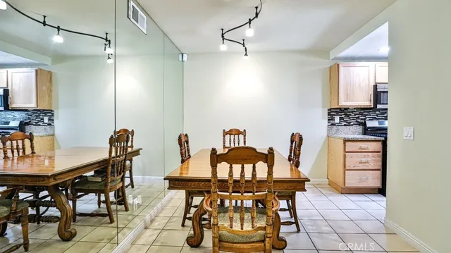 a view of a dining room with furniture