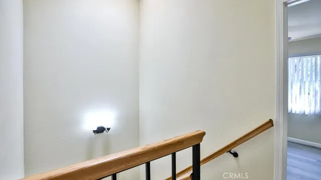 a view of a park that has a tree on the side of it