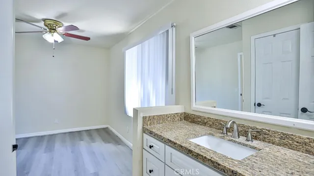 a front view of a house with outdoor seating