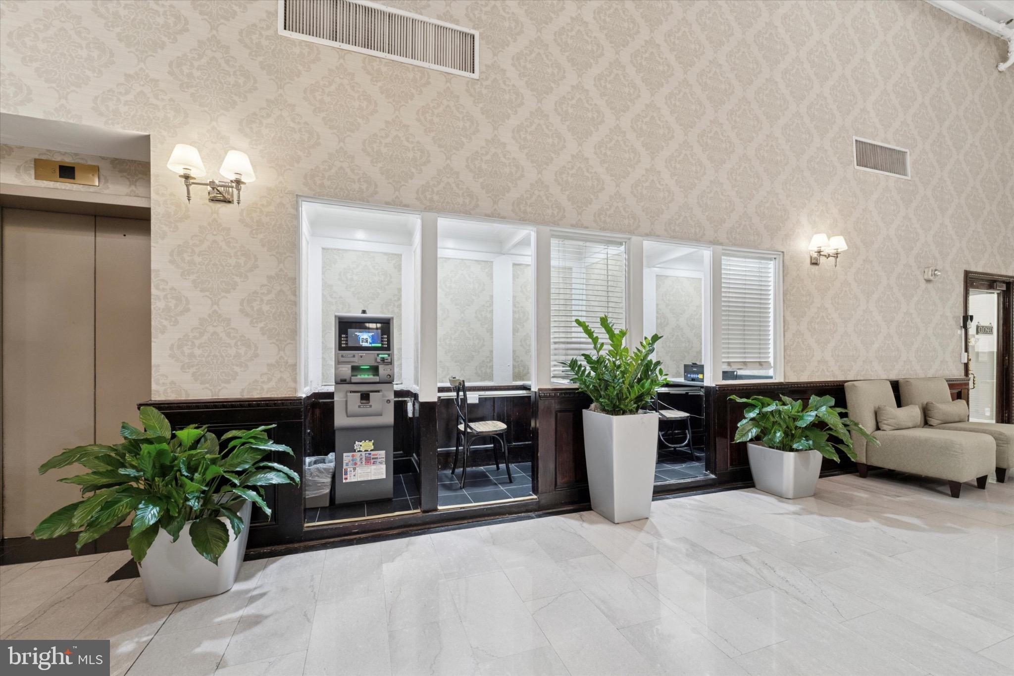 1324 Locust Street, Unit 1121 Philadelphia, PA 19107 - Photo 13 of 25 Elegant lobby with modern amenities.