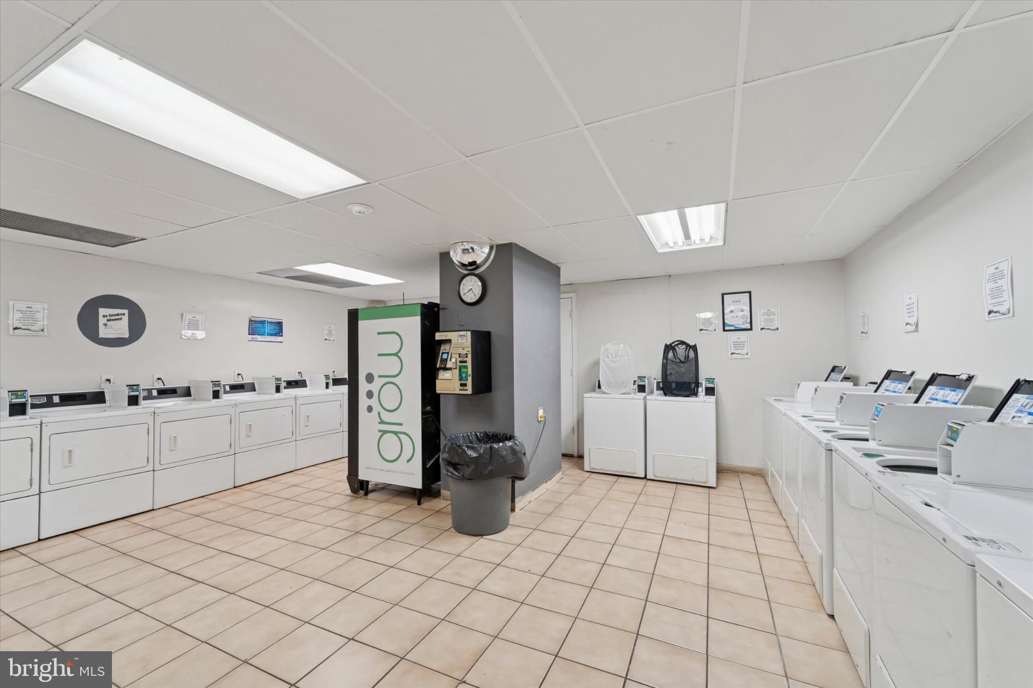 1324 Locust Street, Unit 1121 Philadelphia, PA 19107 - Photo 15 of 25 Bright and modern laundry facility space.