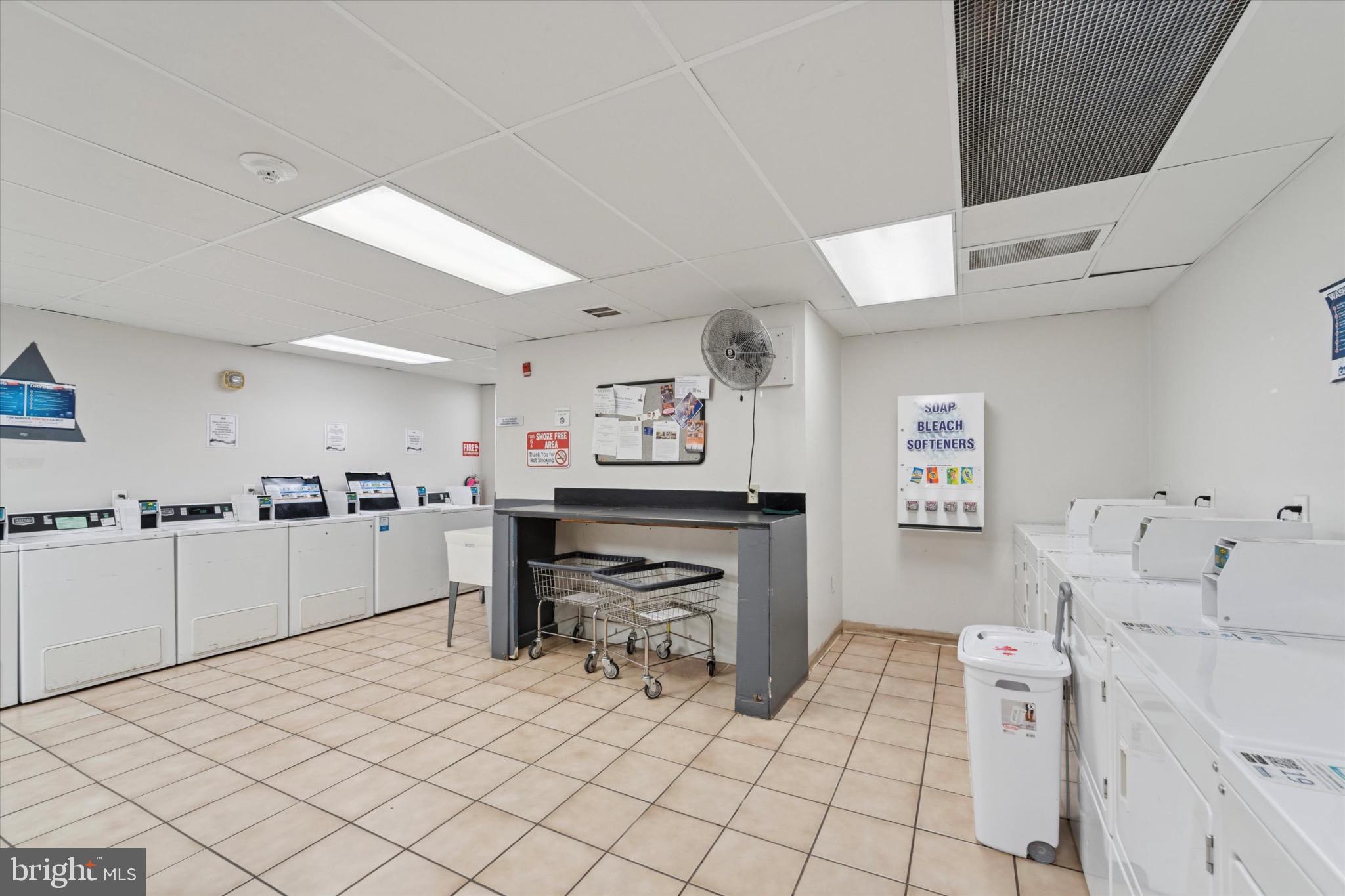 1324 Locust Street, Unit 1121 Philadelphia, PA 19107 - Photo 16 of 25 Bright and functional laundry room space.