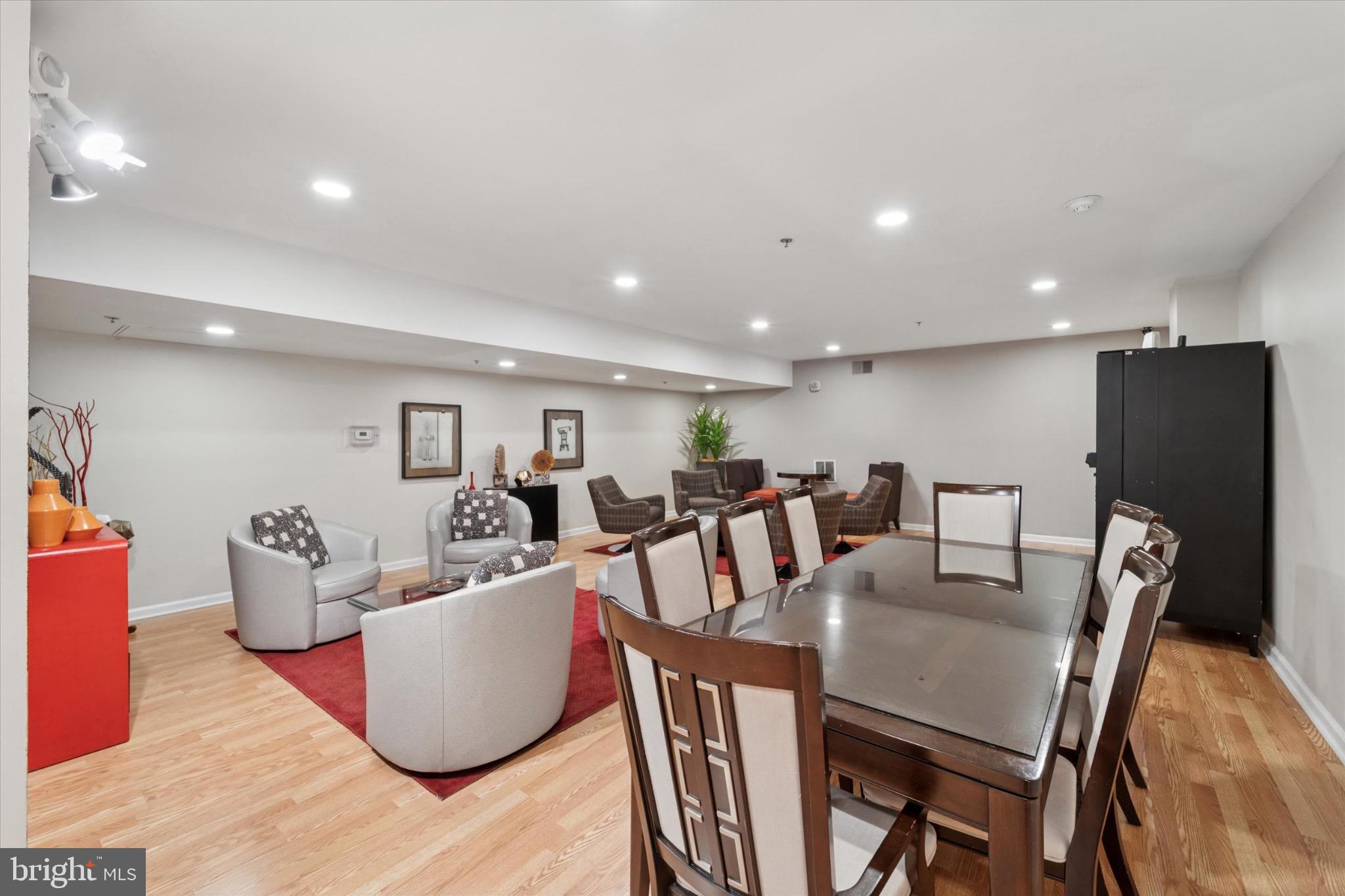 1324 Locust Street, Unit 1121 Philadelphia, PA 19107 - Photo 20 of 25 Spacious modern gathering area with elegance.