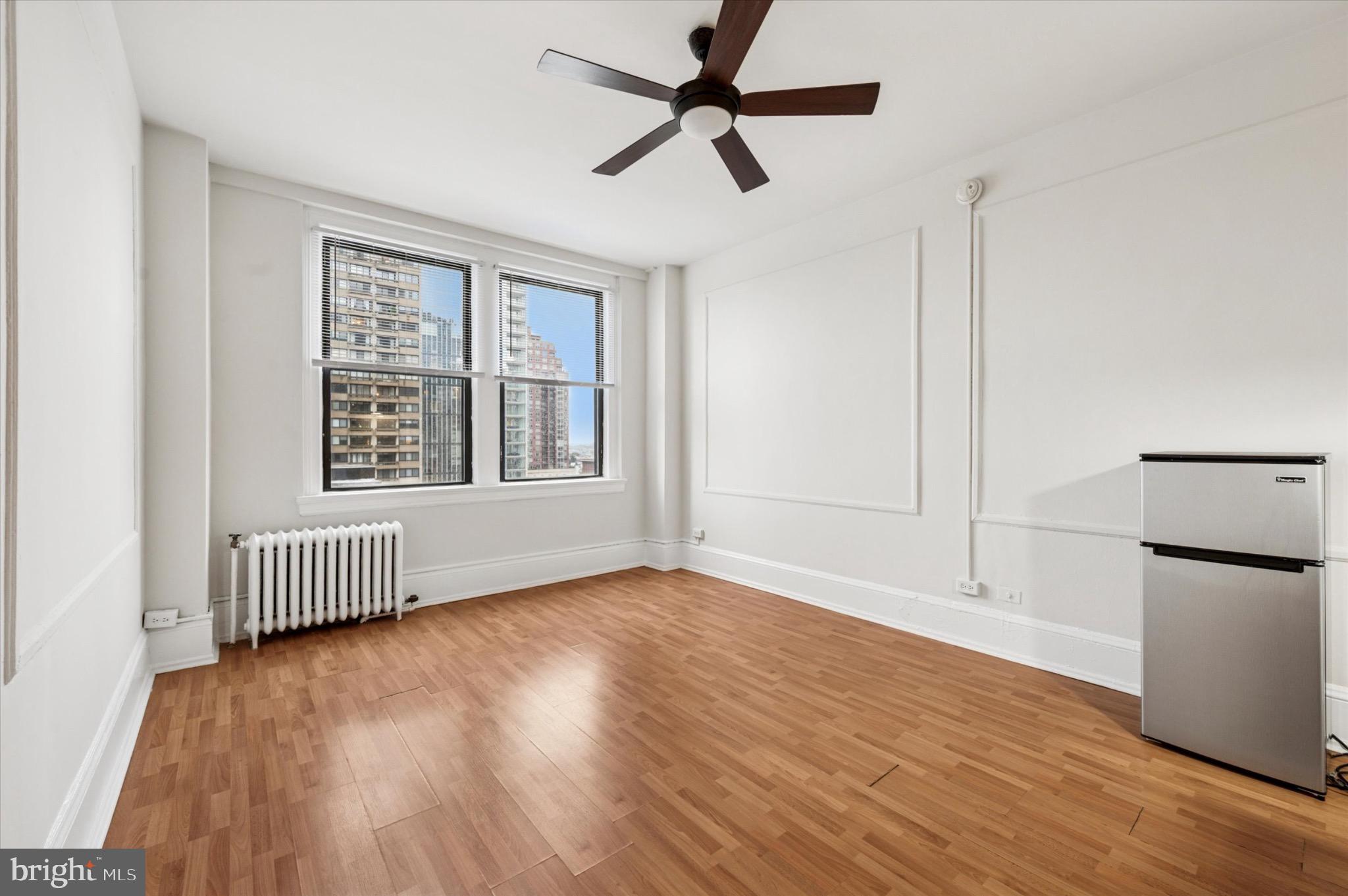 1324 Locust Street, Unit 1121 Philadelphia, PA 19107 - Photo 2 of 25 Bright, airy space with city views.