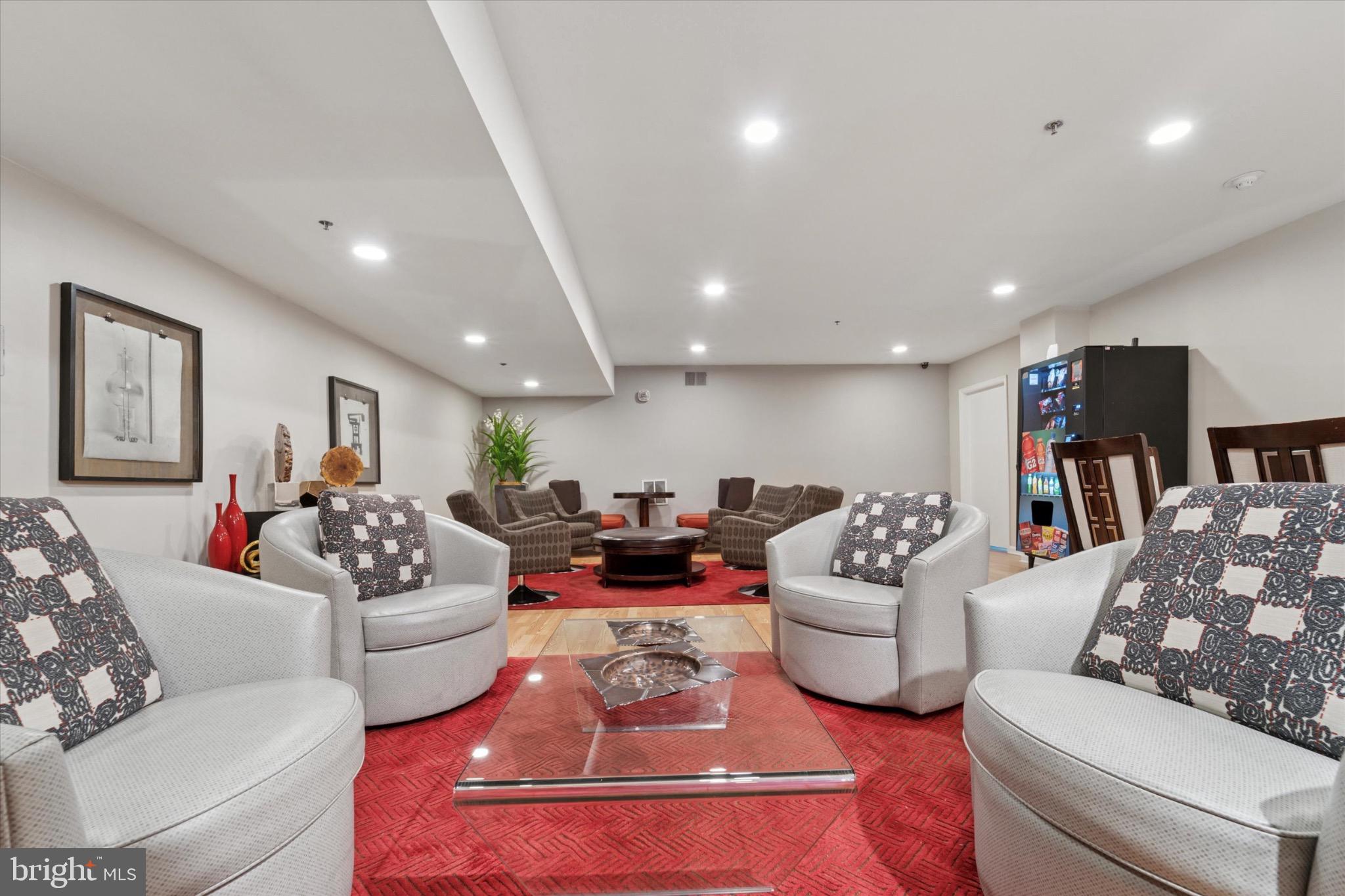 1324 Locust Street, Unit 1121 Philadelphia, PA 19107 - Photo 22 of 25 Inviting lounge with modern decor and warmth.