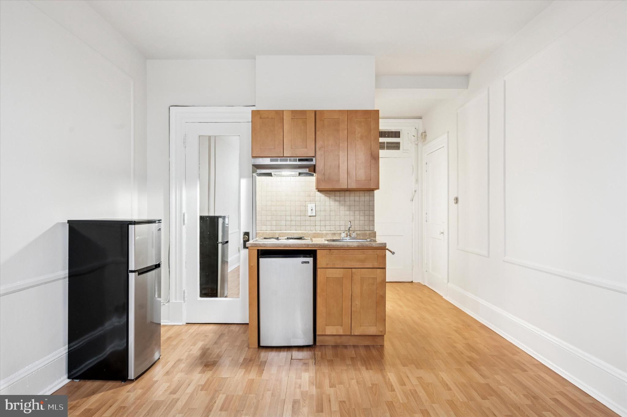 1324 Locust Street, Unit 1121 Philadelphia, PA 19107 - Photo 6 of 25 Charming kitchenette in a bright space.
