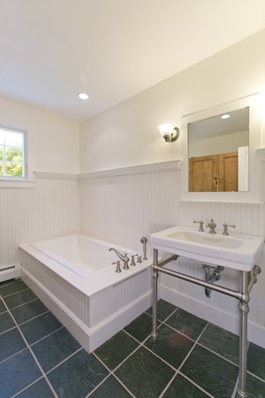 76 Sunset Road Carlisle, MA 01741 - Photo 16 of 29 a bathroom with a sink and a mirror