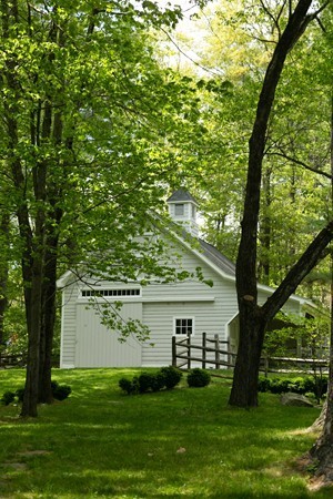 76 Sunset Road Carlisle, MA 01741 - Photo 23 of 29 a view of a backyard with large trees