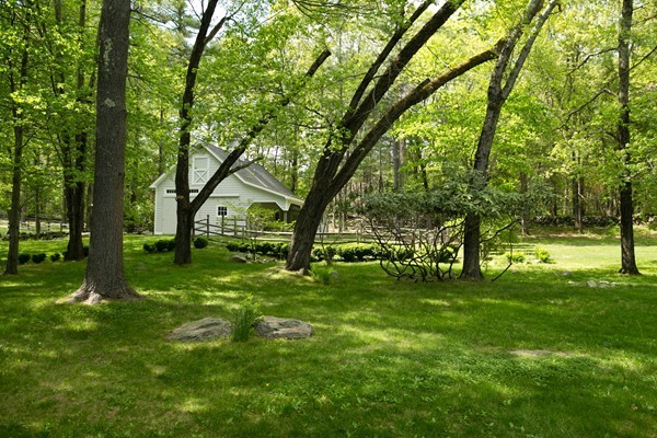 76 Sunset Road Carlisle, MA 01741 - Photo 24 of 29 a view of a house with a big yard