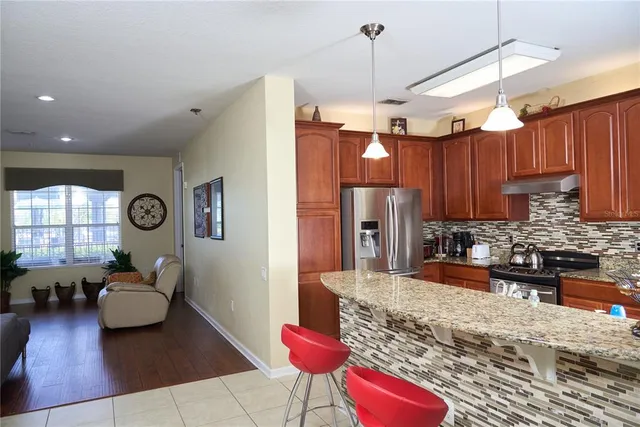 a large kitchen with cabinets
