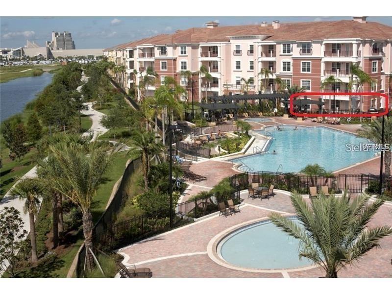 5012 Shoreway Loop, Unit 10407 Orlando, FL 32819 - Photo 27 of 35 a view of swimming pool and outdoor space