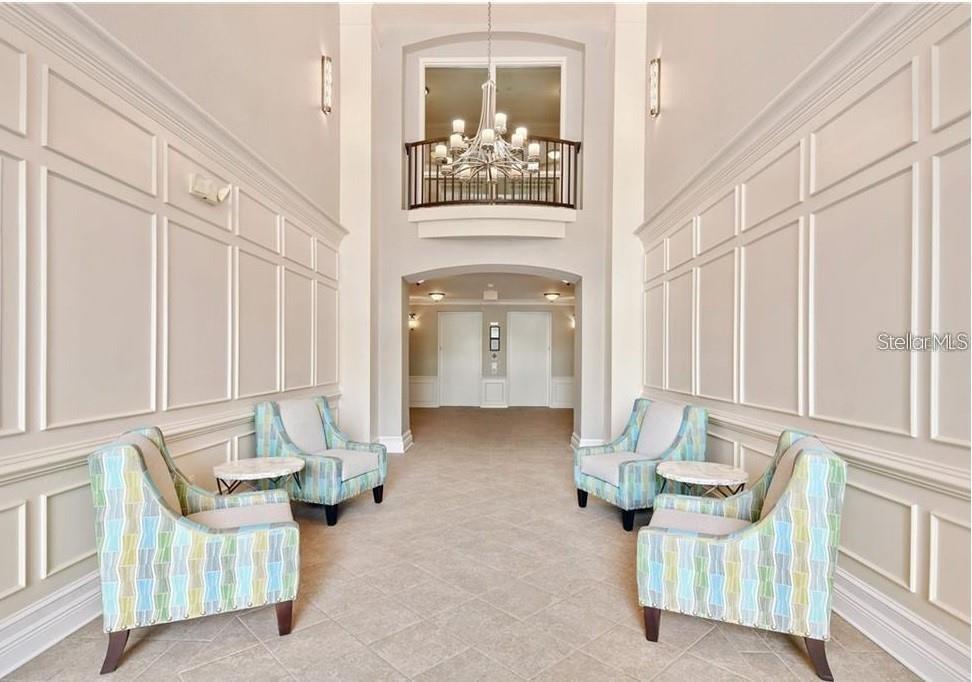 5012 Shoreway Loop, Unit 10407 Orlando, FL 32819 - Photo 4 of 35 a view of front door with furniture