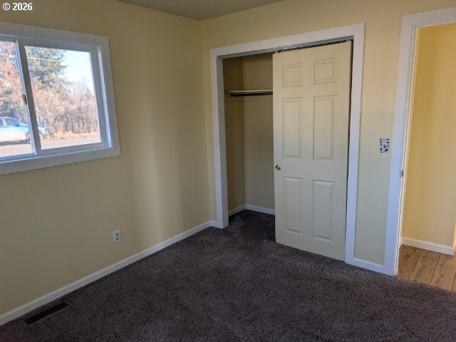 1380 Detroit Street Elgin, OR 97827 - Photo 20 of 28 an empty room with windows and closet
