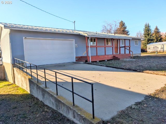 1380 Detroit Street Elgin, OR 97827 - Photo 2 of 28 a view of a house with large windows