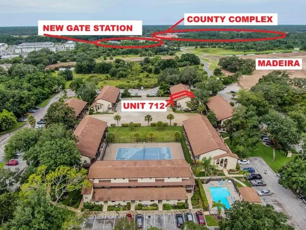 a sign that is sitting on a sidewalk