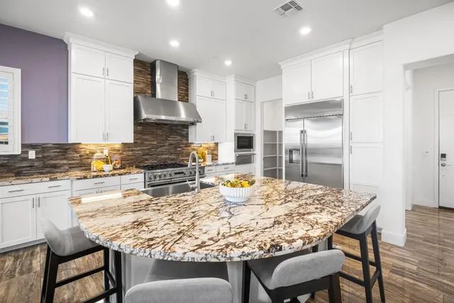 a view of a livingroom with furniture and window
