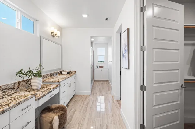 a view of a house with backyard and porch