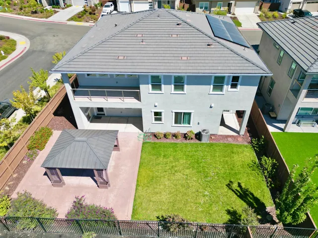 a view of multiple houses with a city street