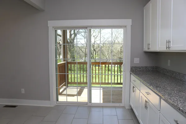 a view of a kitchen with a sink and dishwasher