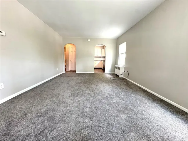 a view of a room with a window