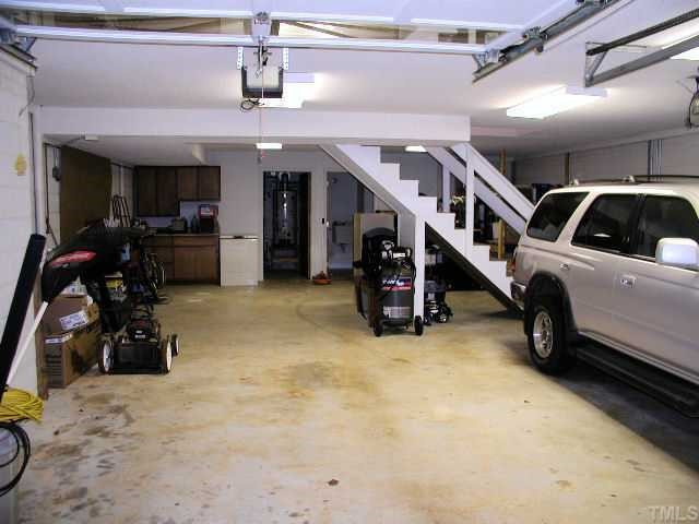6423 Craig Road Durham, NC 27712 - Photo 9 of 12 Large 2 Car Garage and Work Room and Storage Basement