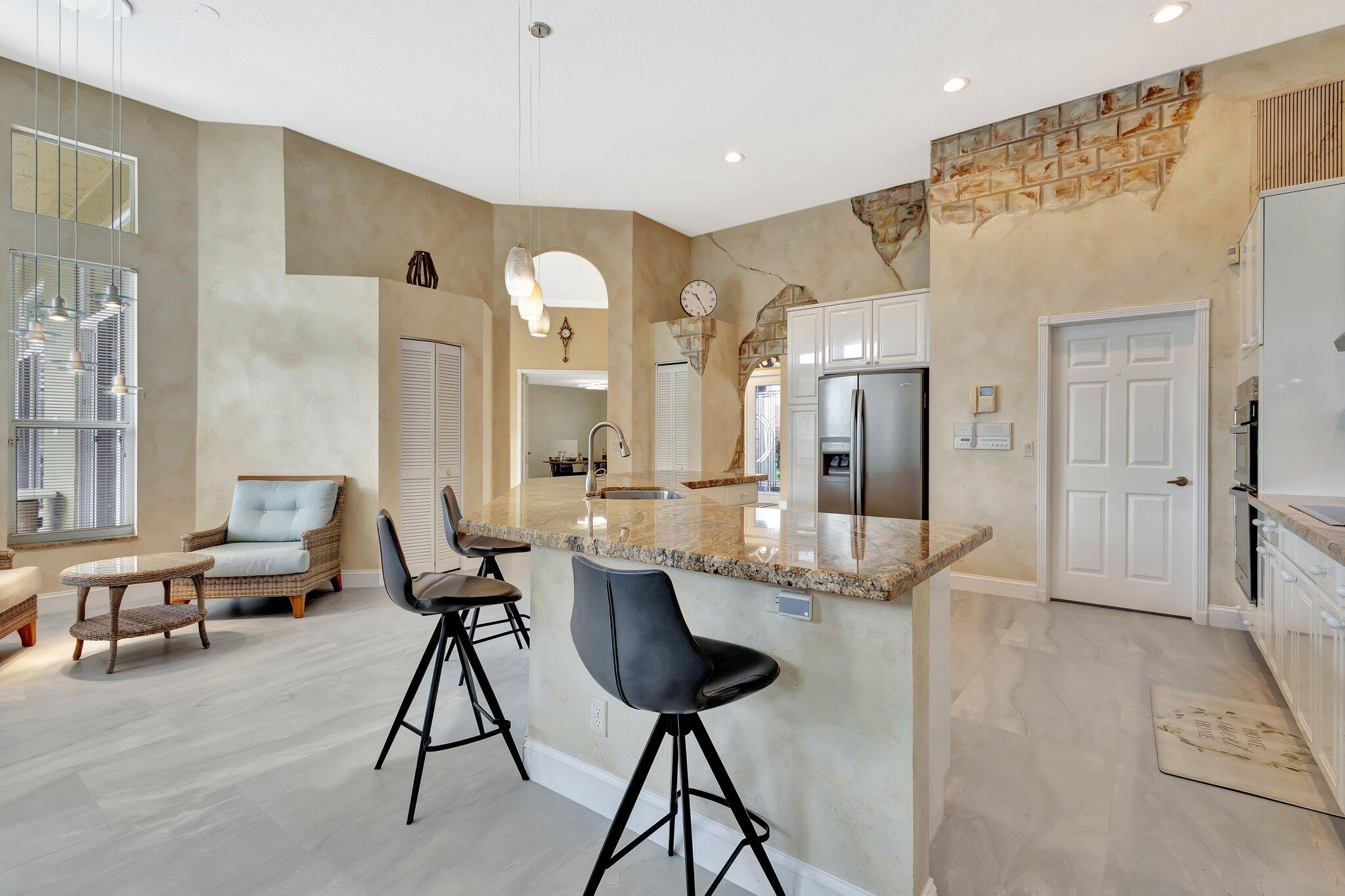 19236 Bay Leaf Court Boca Raton, FL 33498 - Photo 25 of 100 a living room with furniture and a table
