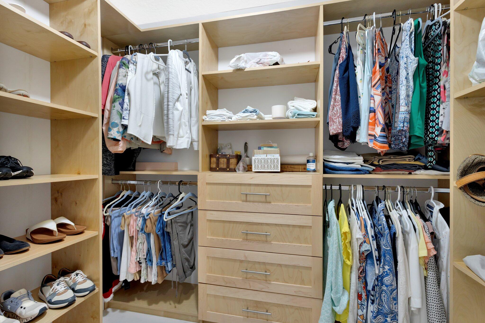 19236 Bay Leaf Court Boca Raton, FL 33498 - Photo 37 of 100 a view of walk in closet with clothes and shoes