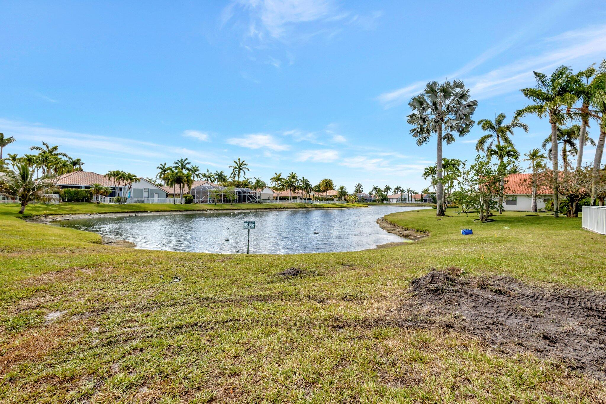 19236 Bay Leaf Court Boca Raton, FL 33498 - Photo 62 of 100 a view of a ocean with houses in the back