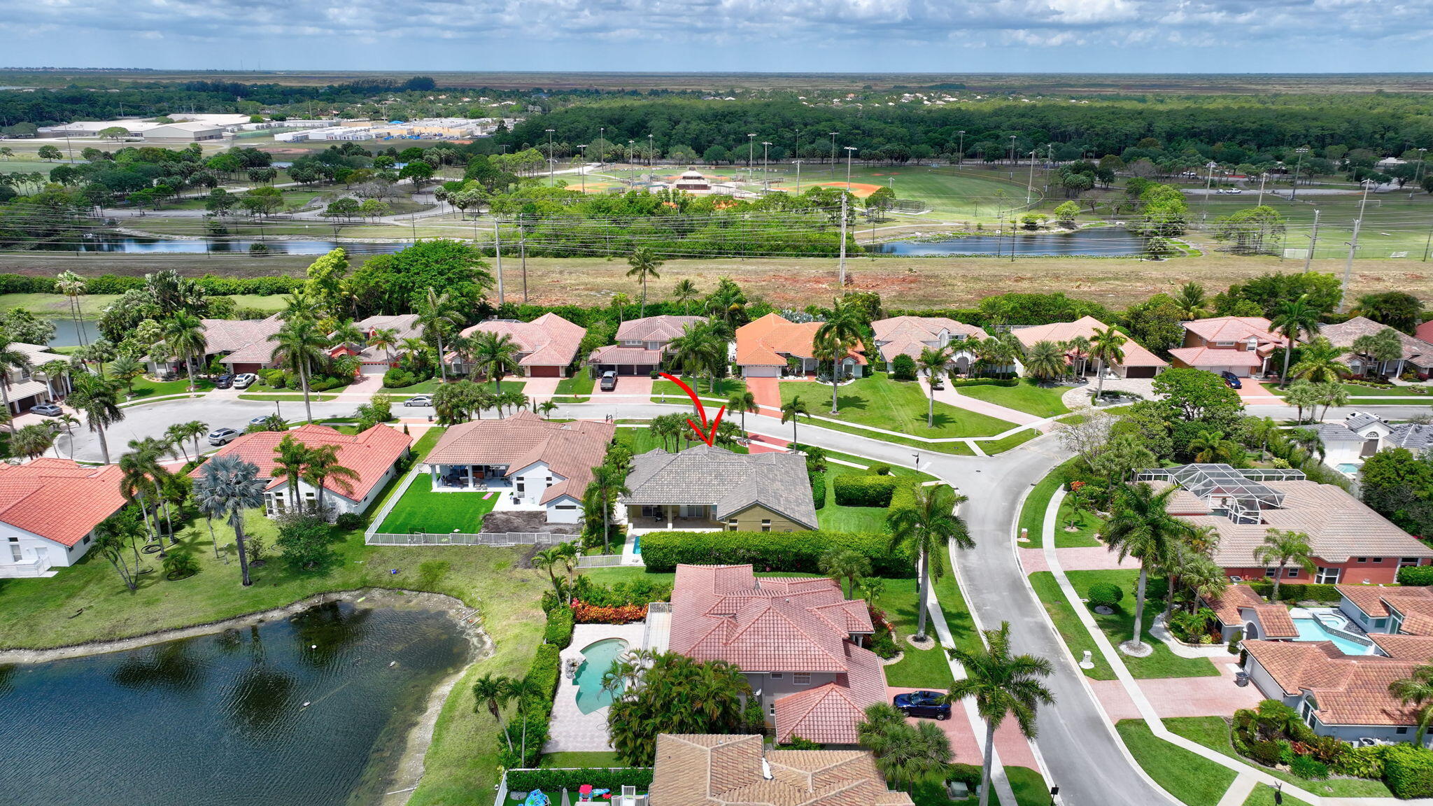 19236 Bay Leaf Court Boca Raton, FL 33498 - Photo 67 of 100 an aerial view of a houses with outdoor space and lake view