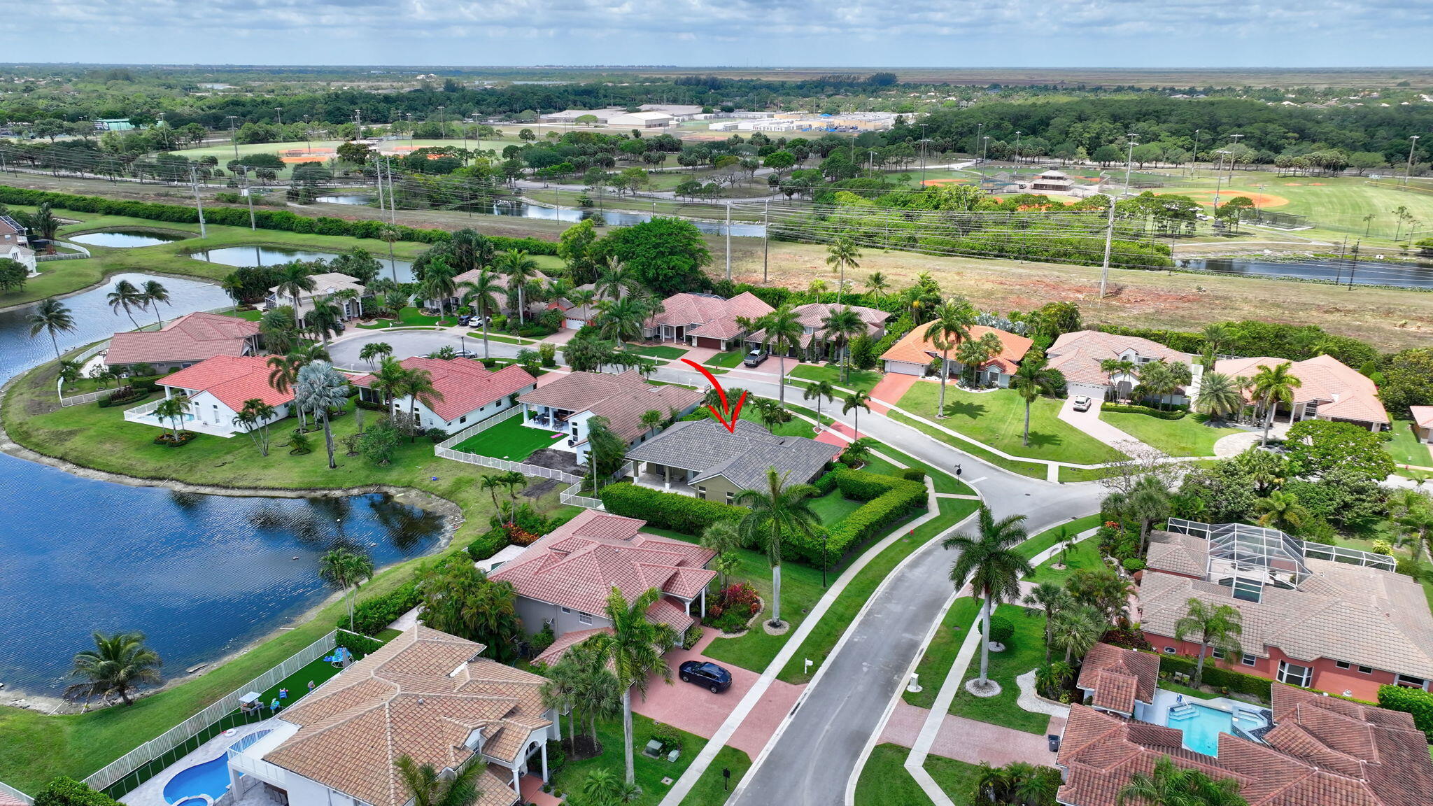 19236 Bay Leaf Court Boca Raton, FL 33498 - Photo 68 of 100 an aerial view of residential houses with outdoor space and street view