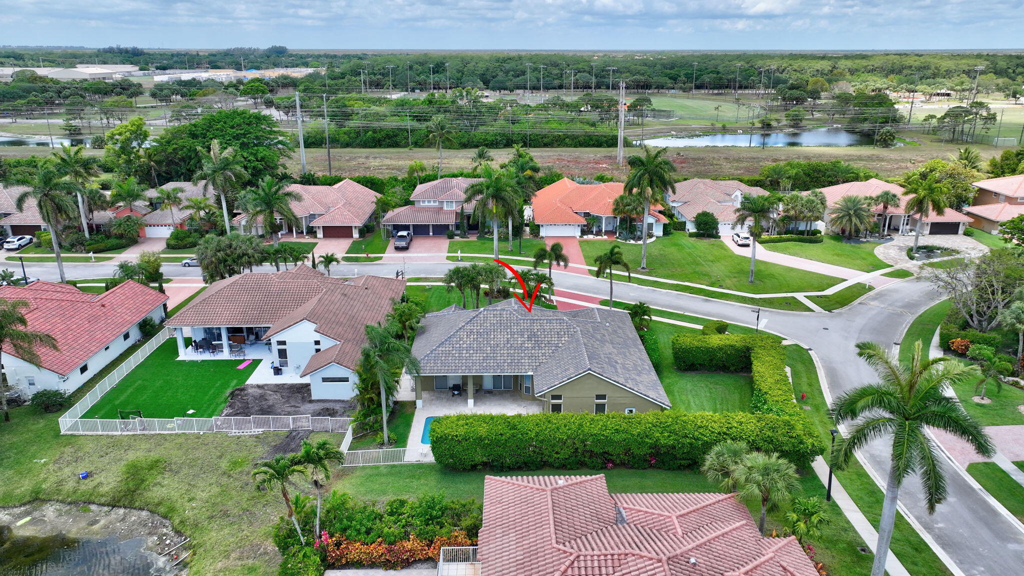 19236 Bay Leaf Court Boca Raton, FL 33498 - Photo 70 of 100 an aerial view of multiple houses with yard
