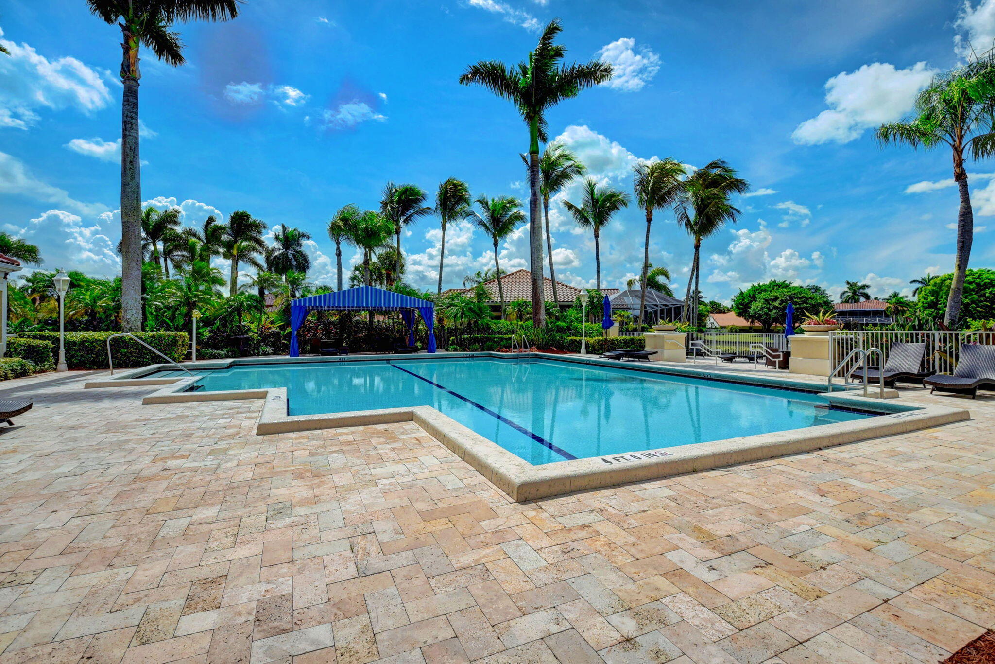 19236 Bay Leaf Court Boca Raton, FL 33498 - Photo 92 of 100 a view of a swimming pool with a lounge chairs