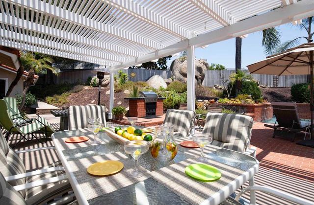 a view of a chairs and tables in patio