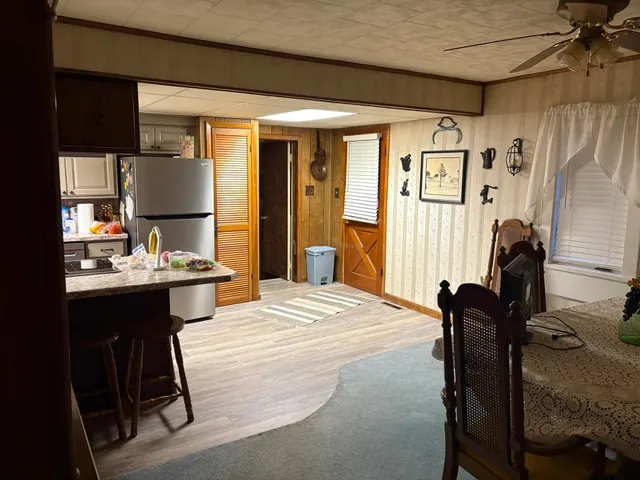 a bedroom with furniture and a window