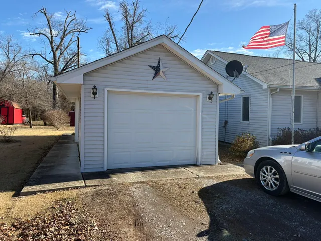 a car parked in front of a house