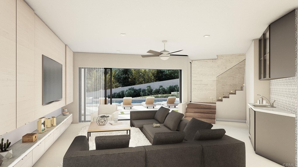 516 Ford Avenue Solana Beach, CA 92075 - Photo 8 of 20 a living room with furniture and a flat screen tv