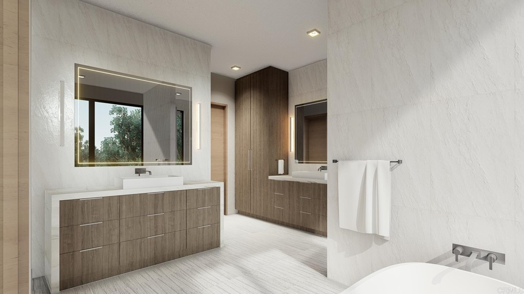 516 Ford Avenue Solana Beach, CA 92075 - Photo 10 of 20 a bathroom with a tub sink and mirror