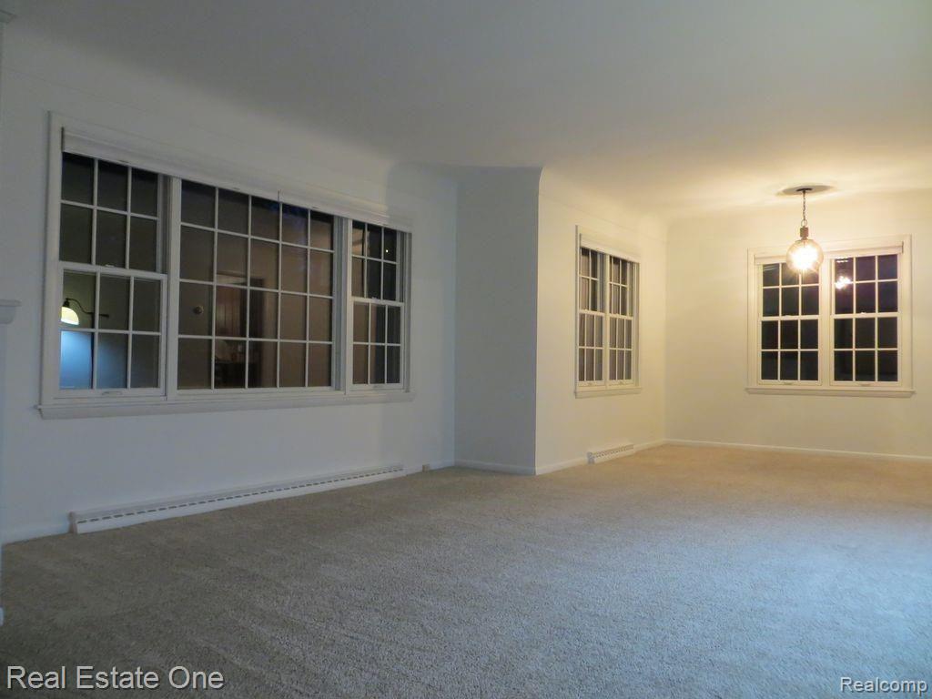 405 West Square Lake Road Troy, MI 48098 - Photo 13 of 24 405 W Sq Lk Living and Dining .jpg