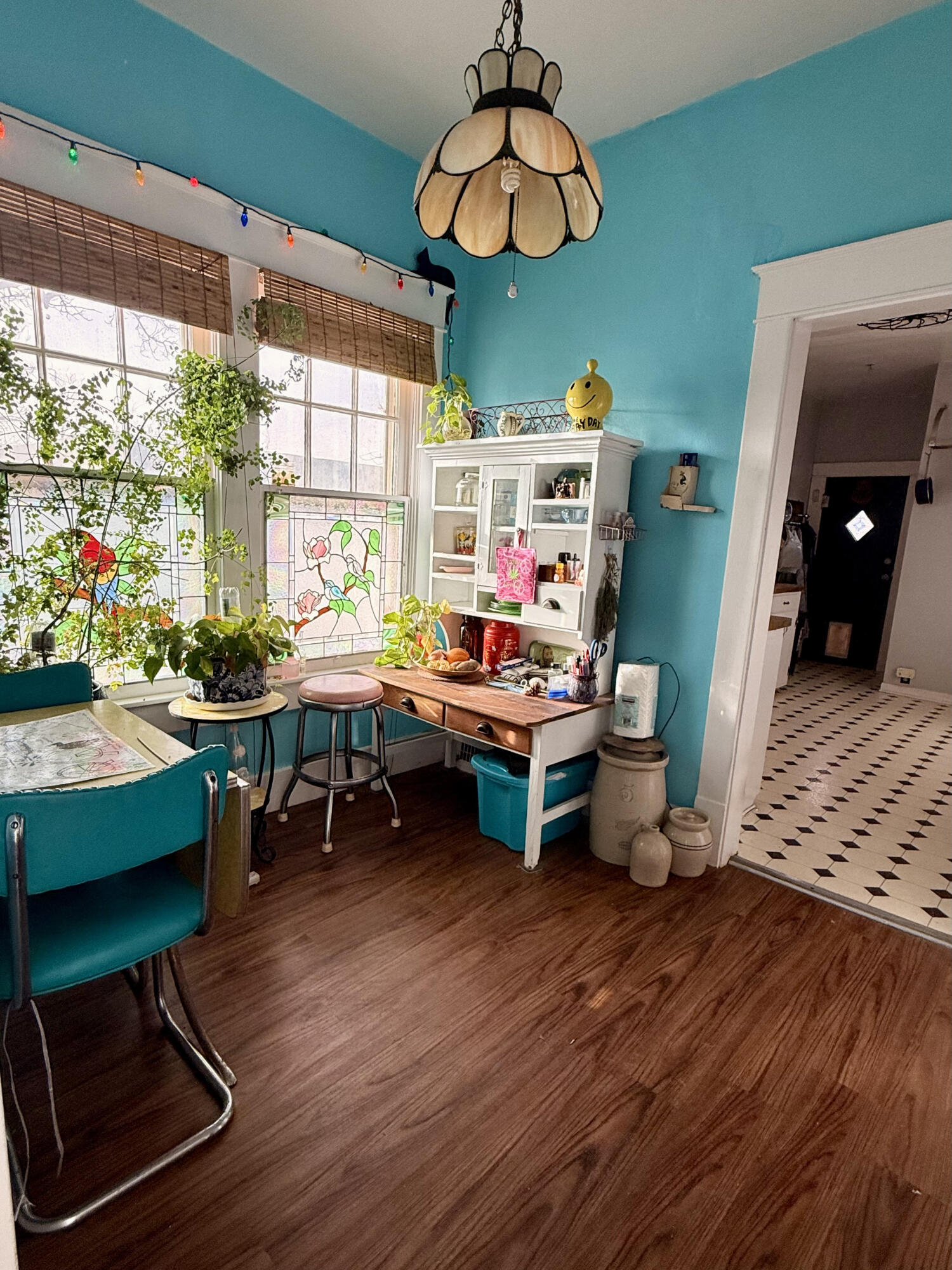 302 West 10th Street Post, TX 79356 - Photo 11 of 30 a living room with furniture a window and wooden floor