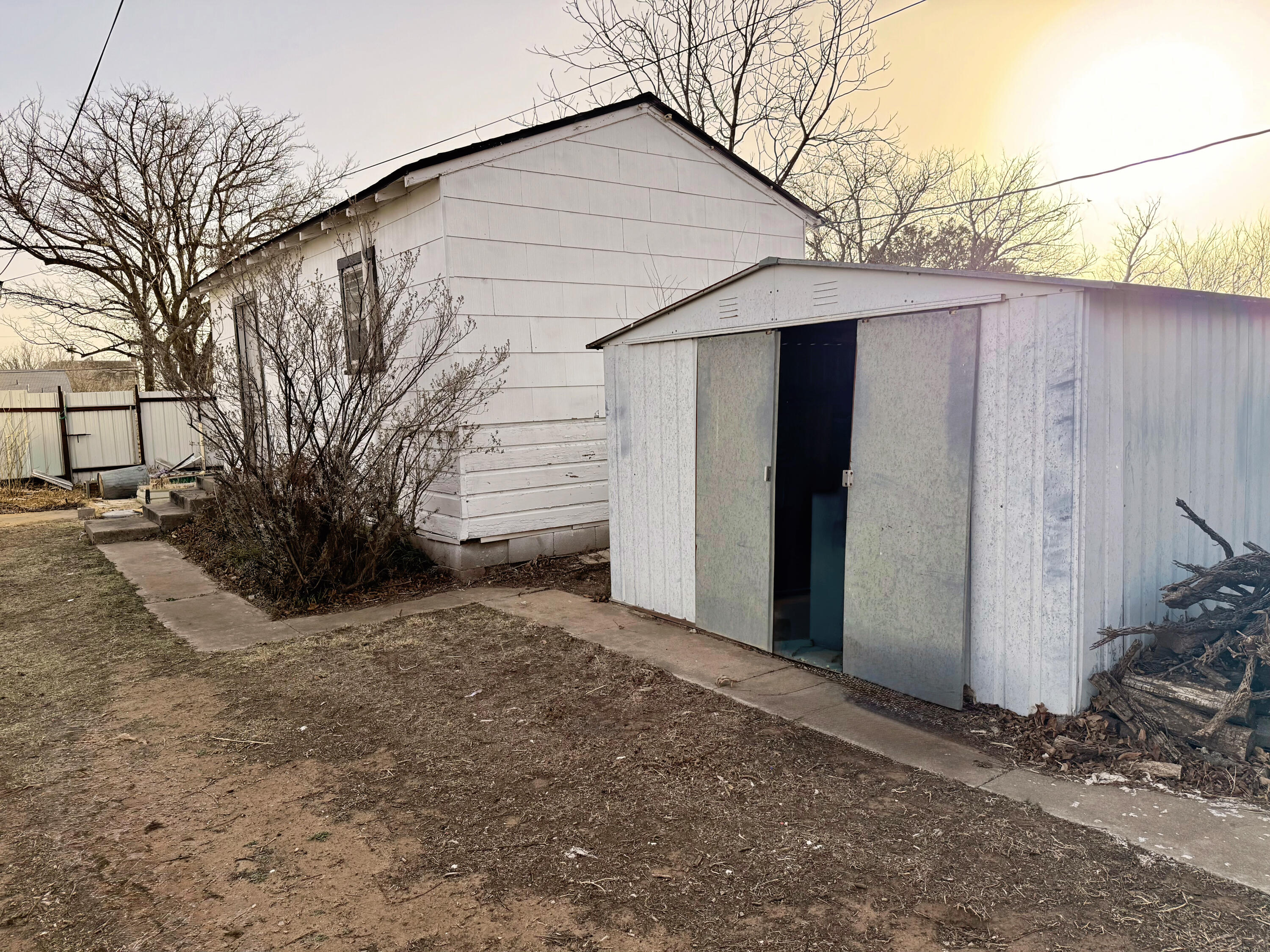 302 West 10th Street Post, TX 79356 - Photo 28 of 30 a view of a house with a yard