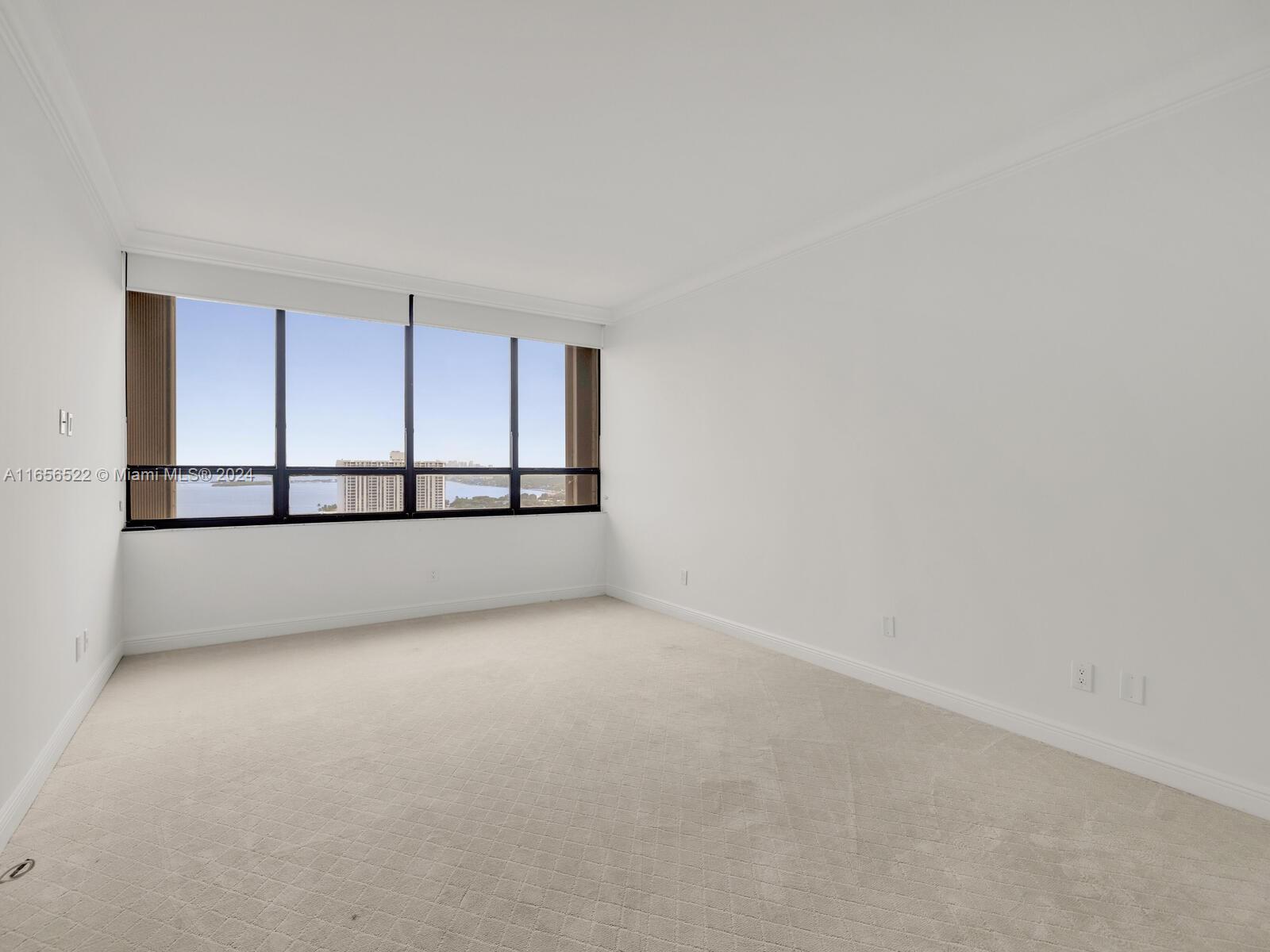 11113 Biscayne Boulevard, Unit PH5 Miami, FL 33181 - Photo 25 of 58 a view of an empty room
