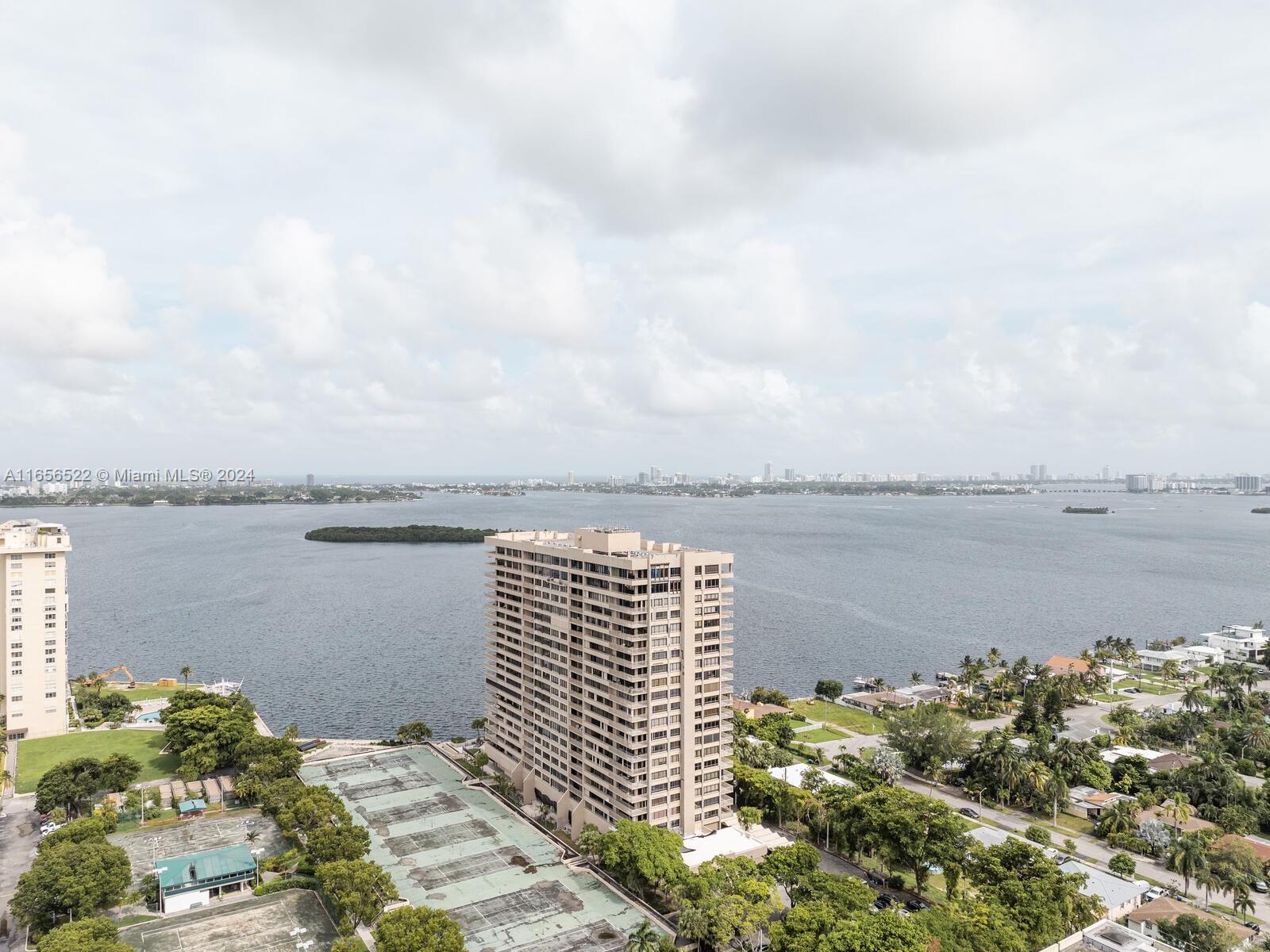 11113 Biscayne Boulevard, Unit PH5 Miami, FL 33181 - Photo 3 of 58 a view of lake