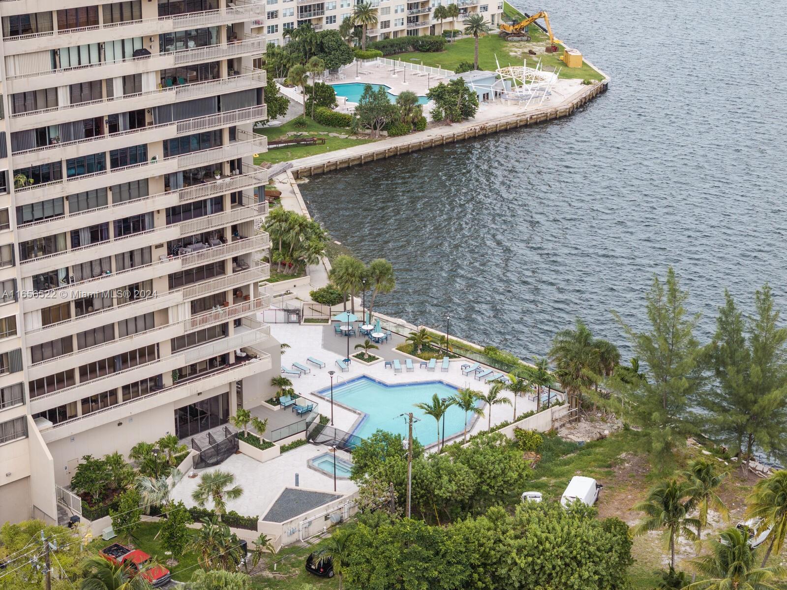 11113 Biscayne Boulevard, Unit PH5 Miami, FL 33181 - Photo 46 of 58 a view of a balcony with plants