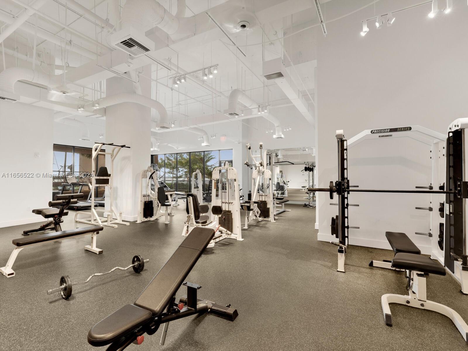 11113 Biscayne Boulevard, Unit PH5 Miami, FL 33181 - Photo 52 of 58 a view of a room with gym equipment