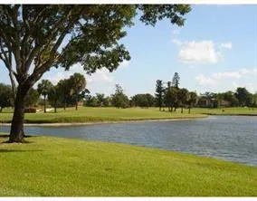 a view of a swimming pool and an outdoor space